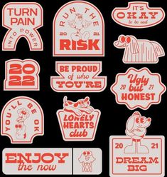 some stickers that are on the side of a black wall with red and white lettering