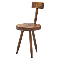 a wooden chair that is sitting on top of a white background with the seat up