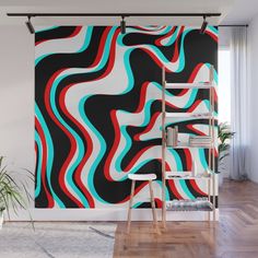 an abstract wall mural with red, blue and black wavy lines