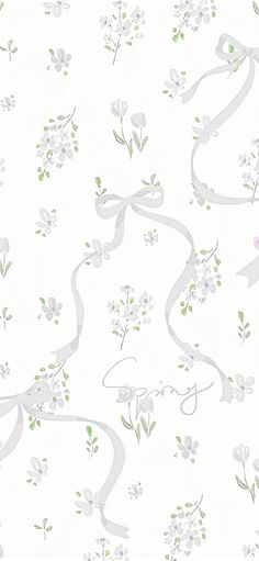 a white wallpaper with flowers and ribbons