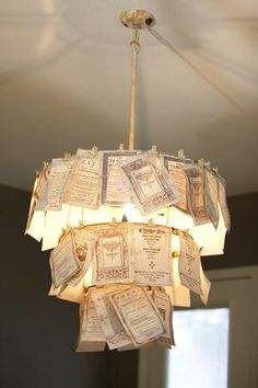 a chandelier made out of old book pages