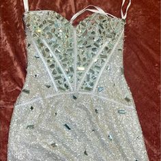 Beautiful Embellished Dress Elegant Sequin Dress With Rhinestones And Sweetheart Neckline, Bedazzled Sleeveless Dress For Party Season, Sleeveless Bedazzled Dress For Party Season, Bedazzled Sleeveless Cocktail Dress, Sleeveless Bedazzled Cocktail Dress, Sleeveless Bedazzled Dress For Cocktail Occasions, Embellished Dresses For Party And Prom Season, Formal Embellished Mini Dress With Sweetheart Neckline, Embellished Night Out Dress For Party Season