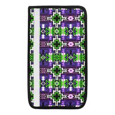 an ipad case with purple and green designs