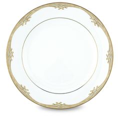 an empty white and gold plate on a white background