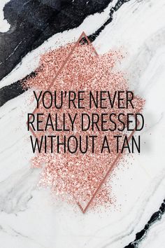 the words you're never really dressed without a tan are shown in pink glitter