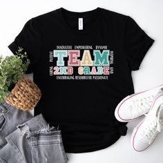 "Christmas shopping deadlines are Dec. 10th These Second Grade Team Shirts are the cutest for your back to school wardrobe!  Can be customized to fit your grade levels team. Printed on your Bella Canvas Unisex soft style tee, this is a must have for your dream team or grade level squad for back to school this year.   1-) Please, check and review all the photos. 2-) Choose your t-shirt size and color. *Different styles of shirts may have different shades of same color choice due to different manufacturer brands. *For this reason, we recommend you to match shirts from the same styles if you want precisely matching colors (ex. Unisex, V-necks, Toddler, etc.). 3-) Click add to cart. You can go back to add more shirts. 4-)Click \"Proceed to check out\". 5-)When you check out, you can add a note Sporty School T-shirt With Name Print, School Team Spirit Short Sleeve Top, Team Spirit Short Sleeve School Top, Short Sleeve Tops For School With Team Spirit Style, Team Spirit Tops With Letter Print For School, School Tops With Team Spirit Letter Print, School Tops With Letter Print And Team Spirit, Sporty T-shirt With Name Print For School, Team Spirit Tops With Name Print For School