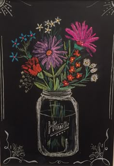 a chalkboard drawing of flowers in a mason jar