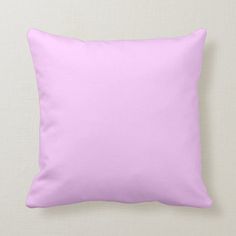 a pink pillow on a white background