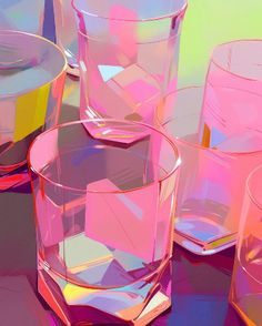 several different colored glasses sitting on top of a table