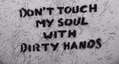 graffiti on the side of a building that says don't touch my soul with dirty hands