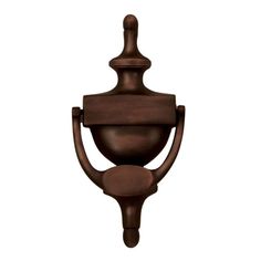 an old fashioned light fixture with a brown finish on the top and bottom part of it