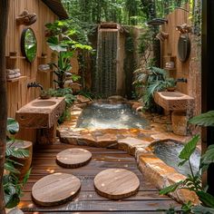 an outdoor shower area with wooden benches and water feature in the center, surrounded by greenery