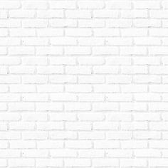 a white brick wall that has been painted black and white