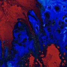 an abstract painting with red, blue and black colors