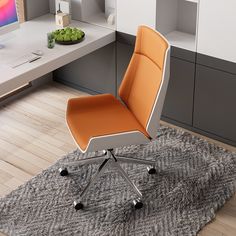 an orange and white office chair sitting on top of a rug in front of a computer desk