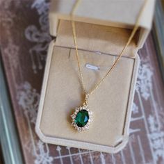 Luxury Emerald Pendant Gemstone, Luxury Green Pendant Jewelry Sets, Luxury Green Pendant Bridal Necklace, Emerald Pendant Necklace Diamond, Luxury Gemstone Pendant Necklaces, Luxury Green Stone Setting Necklaces, Luxury Green Crystal Necklace For Gift, Luxury Pendant Necklaces For Engagement, Luxury Necklaces With Stones For Gift