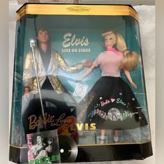 the barbie dolls are in their original packaging