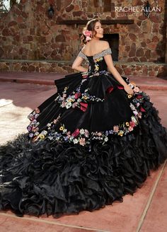 Look unforgettable in this embroidered floral applique long off shoulder velvet dress with A-line ruffled skirt by Rachel Allan RQ3111. Charro style quinceanera ball gown features beaded off-the-shoulder neck line, multi-color floral applique on velvet bodice and skirt overlays, organza ruffle skirt, cathedral train, and lace-up back closure. Off Shoulder Ruffled Quinceanera Dress by Rachel Allan RQ3111 Rachel Allan Charro Collection: Fall 2023 Style Number: RQ3111 Fabric: Velvet, Organza, Appli Organza Applique, Quinceanera Dresses Mexican, Vestido Charro, Mexican Quinceanera, Black Quinceanera Dresses, Mexican Quinceanera Dresses, Quinceanera Themes Dresses, Charro Quinceanera Dresses, Peplum Designs