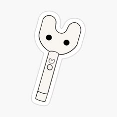 a toothbrush sticker with the shape of a toothbrush sticking out of it's mouth