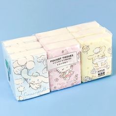 three different types of soaps on a blue background, one is white and the other is pink