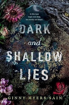 the cover of dark and shallow lies by ginnymyerssann, with flowers on it