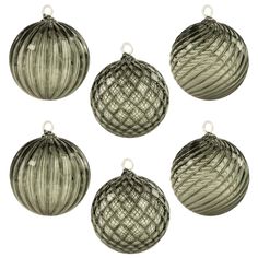 four silver glass ornaments hanging from strings