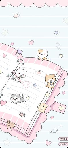 an open book with cats and hearts on it