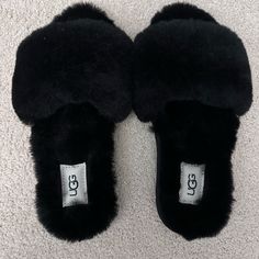 Ugg Brand New Black Fuzzy Slippers In Excellent Condition With No Damages Or Defects. Comes From A Smoke Free And Pet Free Home. Black Slip-on Winter Slippers, Comfortable Black Slippers, Black Cushioned Slippers For Winter, Comfy Black Slip-on Slippers, Black Winter Slippers With Round Toe, Black Flat Slippers For Winter, Black Flat Winter Slippers, Comfortable Black Slippers For Fall, Black Round Toe Slippers For Fall