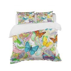 a bed with colorful butterflies on it