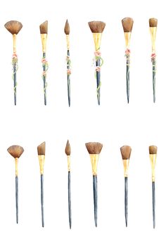 nine brushes are lined up in the shape of an oar and one is painted with watercolors