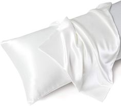 PRICES MAY VARY. Ecoluxe 100% Pure Satin Pillowcase: Made from high-quality 100% pure satin, this pillowcase is soft, smooth, and durable, providing a luxurious sleeping experience for your hair and skin. Standard Size: The standard size of the pillowcase measures 20 inches x 26 inches, making it suitable for most pillows. Hair and Skin Friendly: Satin is known for its ability to prevent hair tangling, frizz, and split ends, as well as to reduce facial wrinkles and skin irritation. Easy Care: Th Silk White Pillowcase, White Pillows Silk, Pillow Case White Hair, White Satin Pillow Case, White Silk Throw Pillows, White Satin Pillowcase, White Silk Pillowcase, Facial Wrinkles, Sleep Accessories