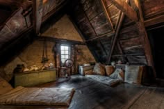 an old attic with wood floors and exposed ceilings