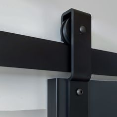 Cavity Sliders Barn Door Track at RealCraft - Hangers close up Barndoor Modern, Cavity Sliders, Exterior Sliding Barn Doors, Barn Door Track System, Exterior Door Hardware, Barn Door Installation, Black Hangers, Modern Sliding Doors, Barn Door Designs