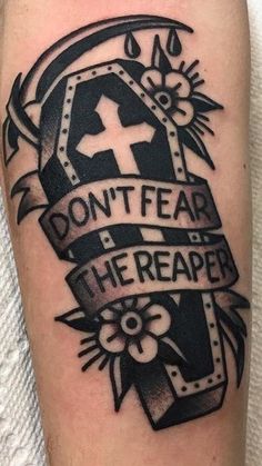 a black and white tattoo with the words don't fear on it