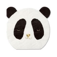 a black and white panda bear face on a round towel with gold nose ring in the shape of a circle