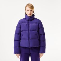 Warm. Easy to fold. Functional. With added Lacoste style. An essential signature down jacket, with impeccable details. Puffer Jacket Women, Crocodiles, 2024 Collection, Puffer Jacket, Purple Color, Outerwear Jackets, Down Jacket, Water Repellent, Stand Up