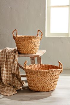 The Chunky Woven Basket Set includes two beautifully crafted baskets made from water hyacinth. These baskets are ideal for organizing and storing a variety of items in your home. The chunky woven design adds a rustic charm to any space, while the water hyacinth material ensures durability and strength. Basket Set, Water Hyacinth, Woven Basket, Woven Design, Basket Sets, Mud Pie, Rustic Charm, Basket Weaving, Baskets