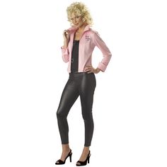 a woman in black pants and pink jacket