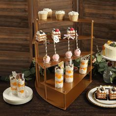 desserts and cupcakes are displayed on display