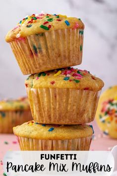 three muffins stacked on top of each other with the words funfetti pancake mix muffins