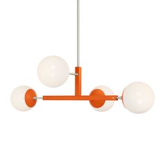 an orange and white chandelier with three glass balls hanging from it's sides