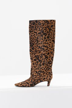 point toe wide, tall shaft bold leopard pattern heel height: 55mm 100% calf leather lining: 100% sheep leather made in italy true to size Toteme Boots, Wide Shaft Boots, Womens Wide Shoes, Boots Leopard, Shaft Boots, Loafer Mules, Sheep Leather, Pony Hair, Clutch Pouch