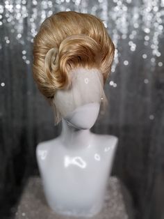 A fully styled synthetic lacefront wig. This style is an elegant 1960s beehive updo style with a front swoop. Colours pictured: Vanilla Caramel, Platinum Blonde Please note: all wigs are made to order, these wigs are for illustrative purposes only. Beehive Updo, Updo Wig, Vintage Wigs, Historical Hairstyles, Lacefront Wig, Drag Wigs, High Fashion Hair, 60s Hair, Vanilla Caramel