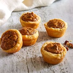 several small muffins sitting on top of a table