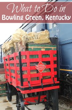 a red wagon with bags on the back is parked next to a blue train and text that reads what to do in bowling green, kentucky