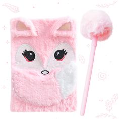 a pink phone case with a furry animal on it and a toothbrush next to it