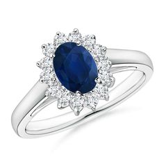 an oval blue sapphire and diamond ring