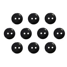 six black buttons with white dots on them