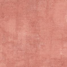 an old, dusty pink background that is very soft and has been used as a wallpaper