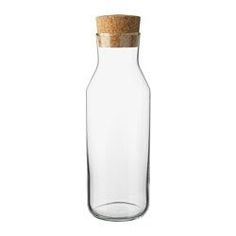 a glass bottle with a cork lid